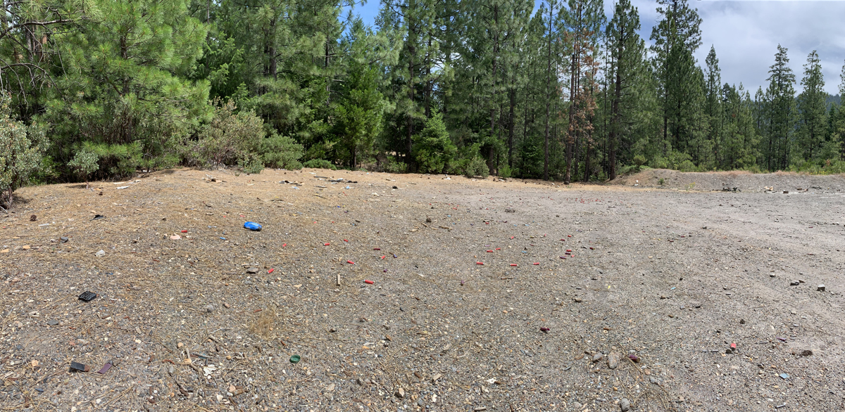 Though difficult to see in this photograph, hundreds of shotgun shells and trash litter the Blue Gouge Mine area in the Eldorado National Forest.