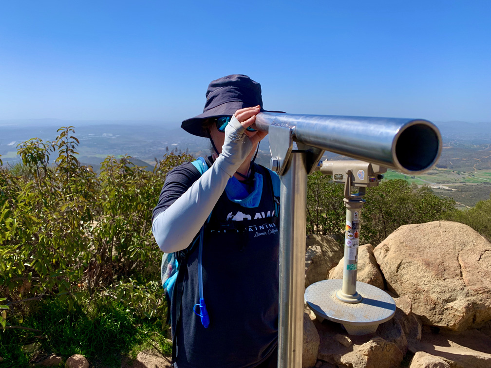 There is dial at the top of Iron Mountain with landmarks on it. You can line them up with the scope and see them in distance on a clear day.
