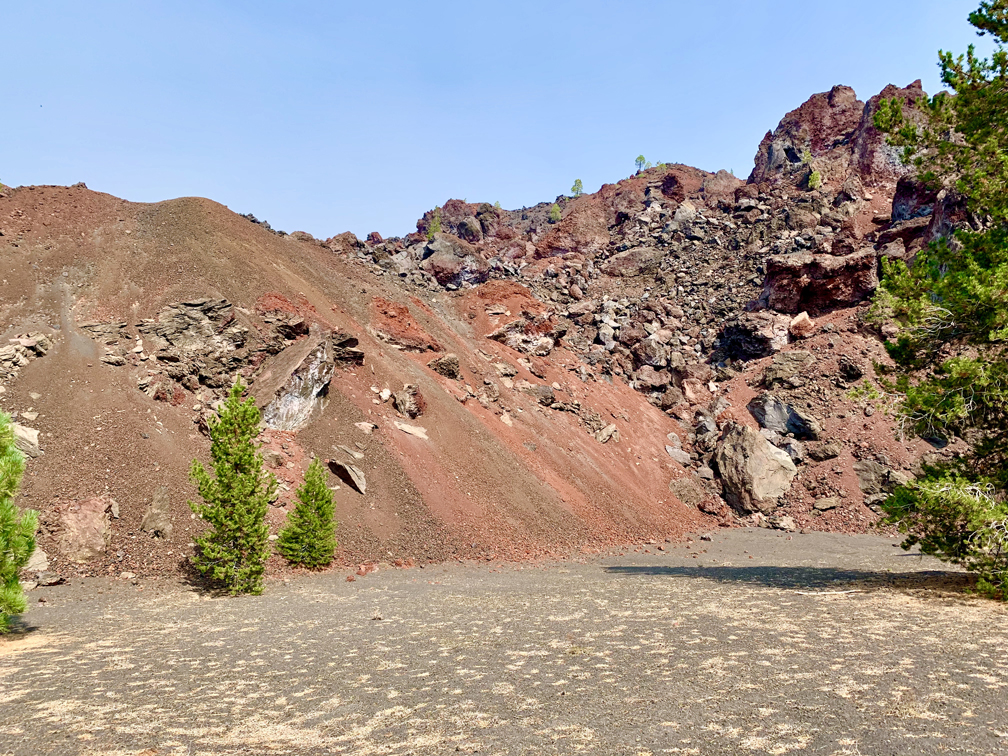 The hike to Snag Lake passes the along the side of the colorful Painted Dunes.