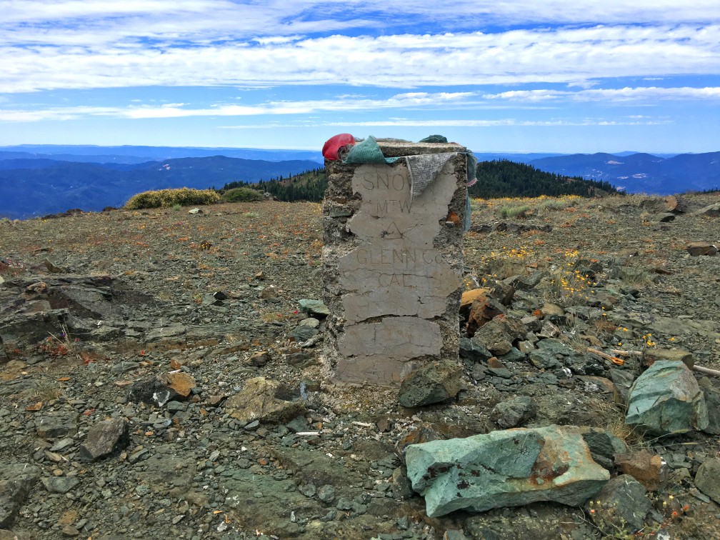 A monolith sits on the West Peak of Snow Mountain with Glenn County engraved into it. There is some confusion here, as maps show the West Peak of Snow Mountain sitting on the lines of the Lake County and Colusa County.
