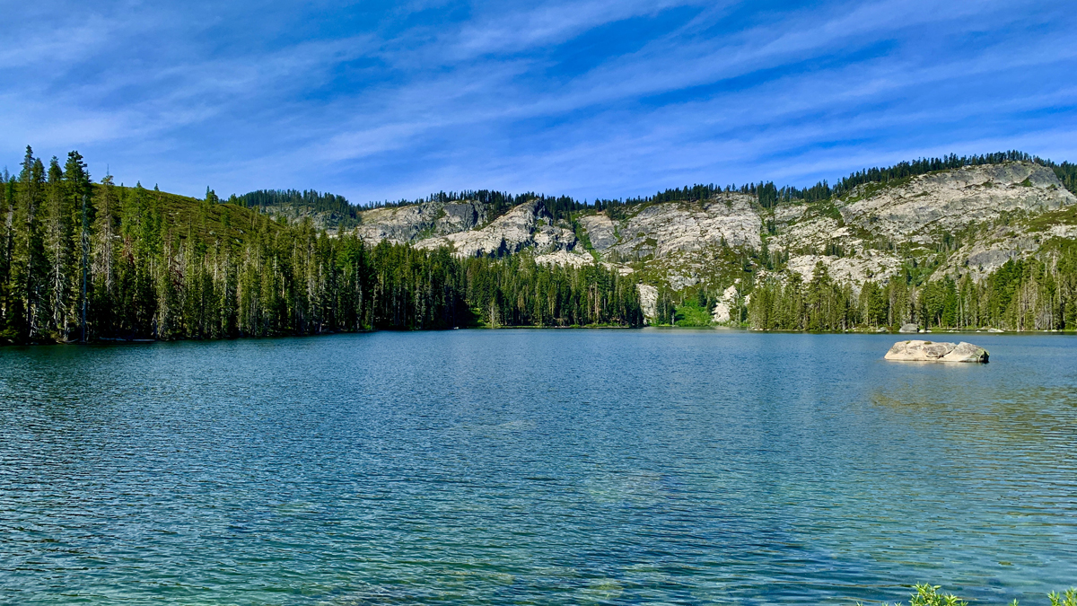Silver Lake with the forest on one side and granite cliffs on the other.
