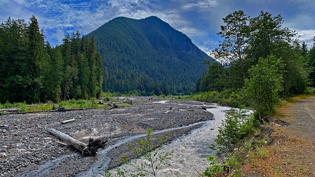 Most of the hike along the Carbon River Trail, you cannot the see the Carbon River, as it is obscured by trees. As you near the Green Lake Trail, the view opens up so you can see the Carbon River.