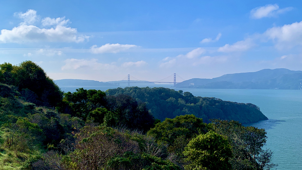 The Golden Gate Bridge can be seen in the distance from Angel Island.