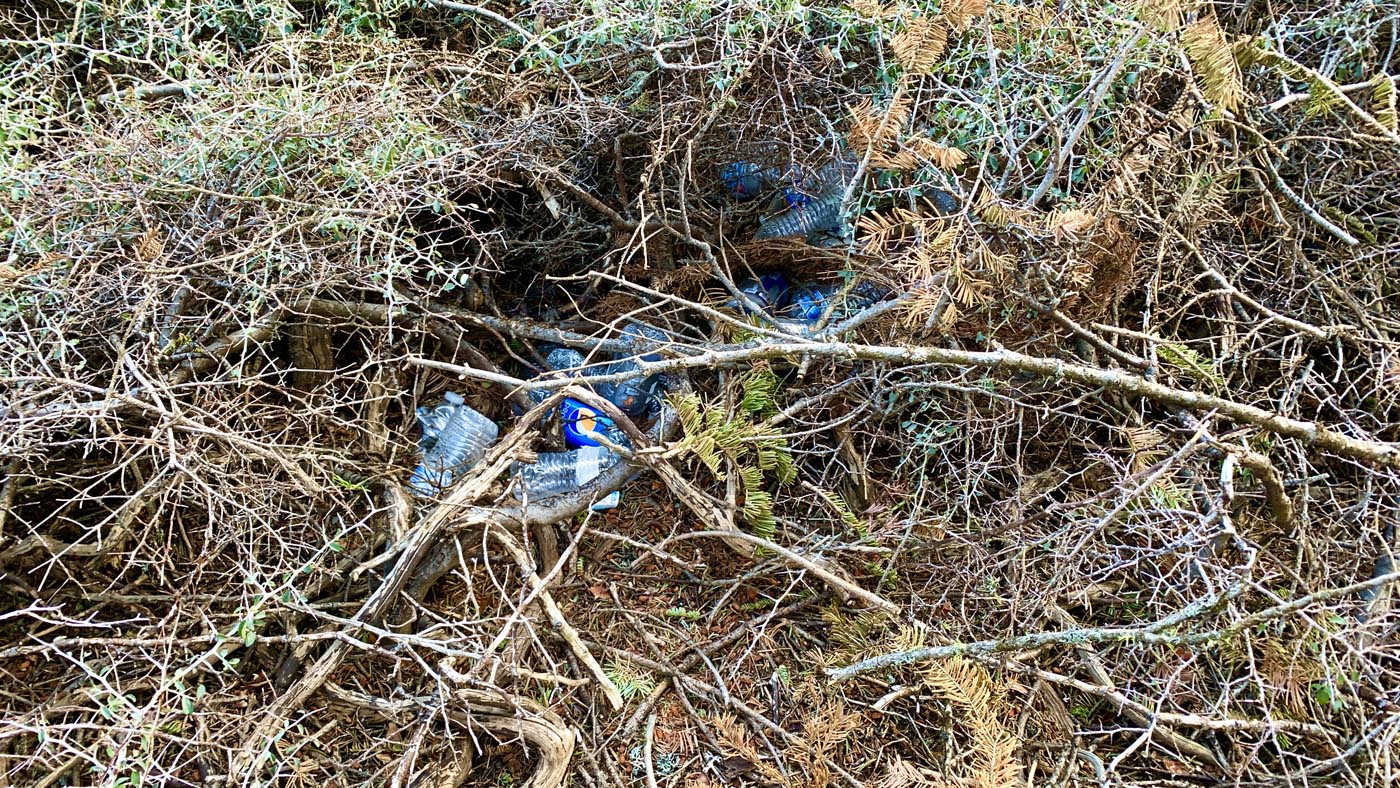 Trash left behind by backpackers and hikers in the Snow Mountain Wilderness.