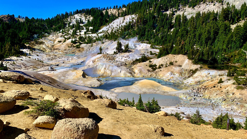 Boiling pools of water dot that landscepe at Bumpass Hell at Lassen Volcanic National Park.