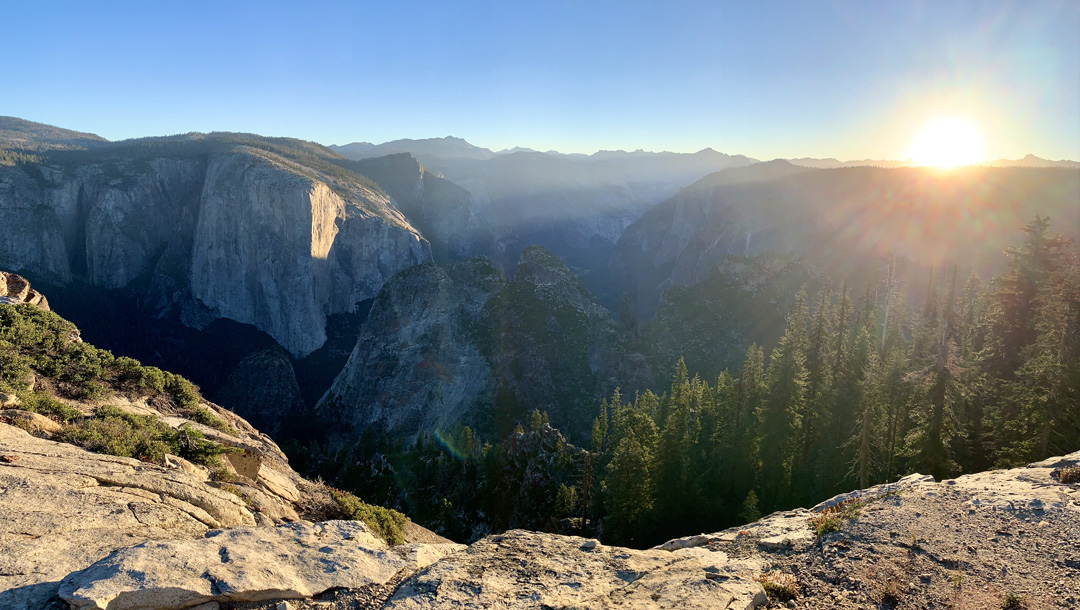 The sun rises over Dewey Point.