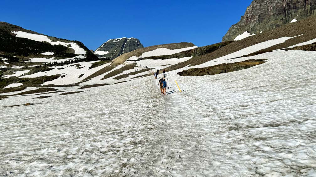 Snow covers the trail to Hidden Lake in Glacier National Park.